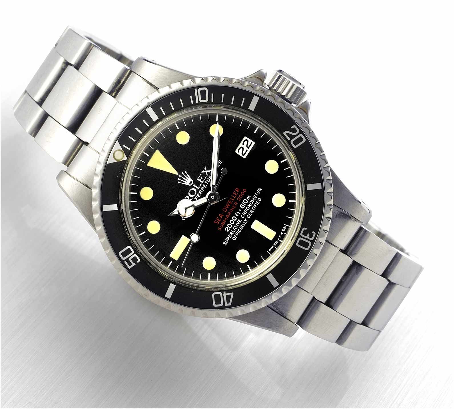 Rolex. A fine and rare stainless steel automatic wristwatch with gas-escape valve, date and the original stainless steel Oyster braceletRef:1665 Double-Red Sea-Dweller  Case No.4135193, ...