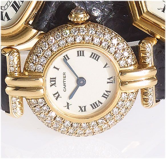 Cartier. A lady's 18ct gold pave diamond set wristwatchRivoli, 1990's
