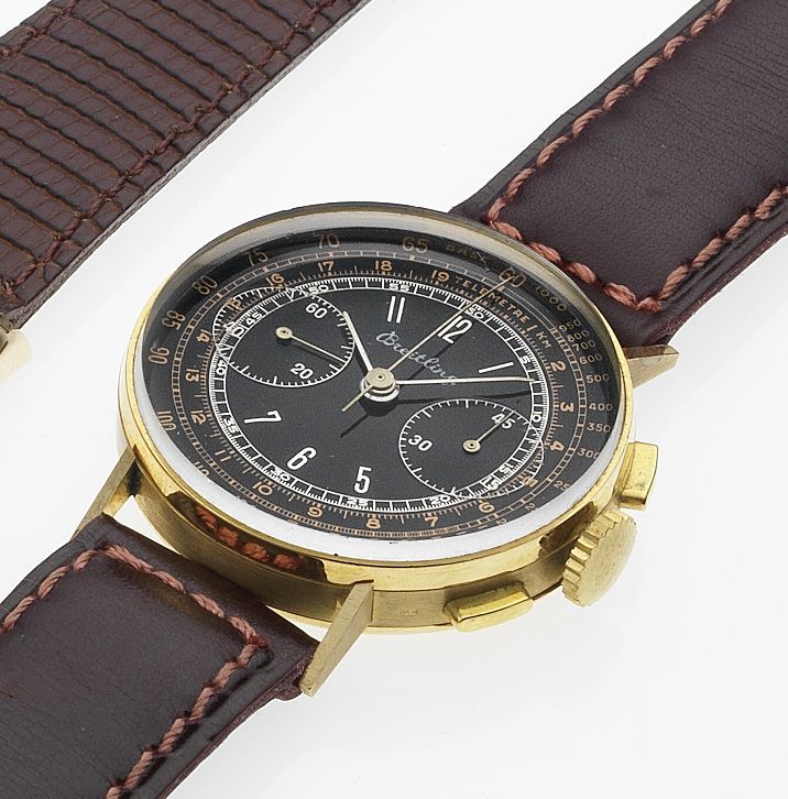 Breitling. An 18ct gold chronograph wristwatch with black dialCase No.449990, 1940's