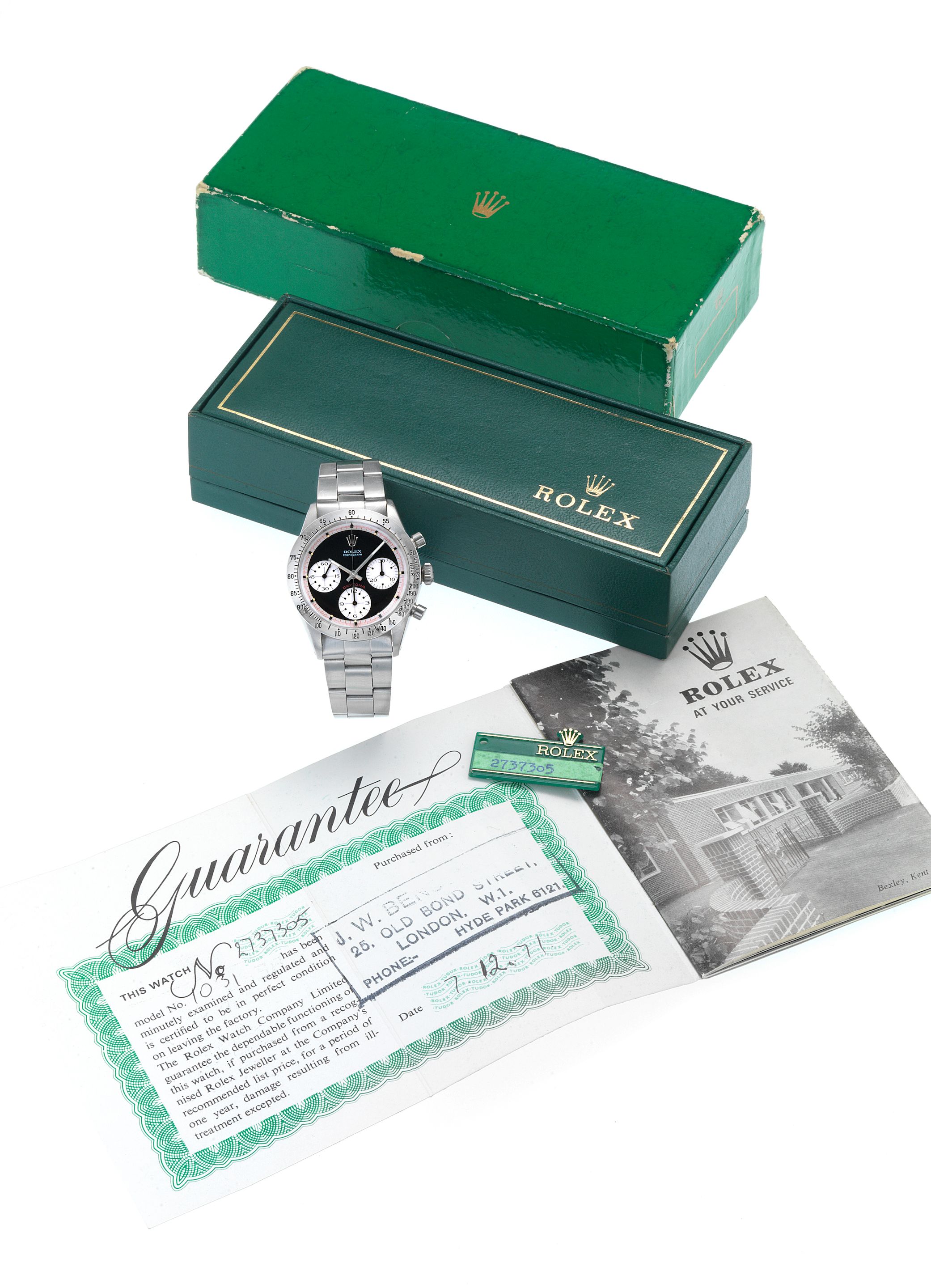 Rolex. A fine and rare stainless steel chronograph wristwatch together with original Rolex guarantee, swing tag, fitted box and instructionsCosmograph Daytona, "Paul Newman", Ref.6262, Case ...