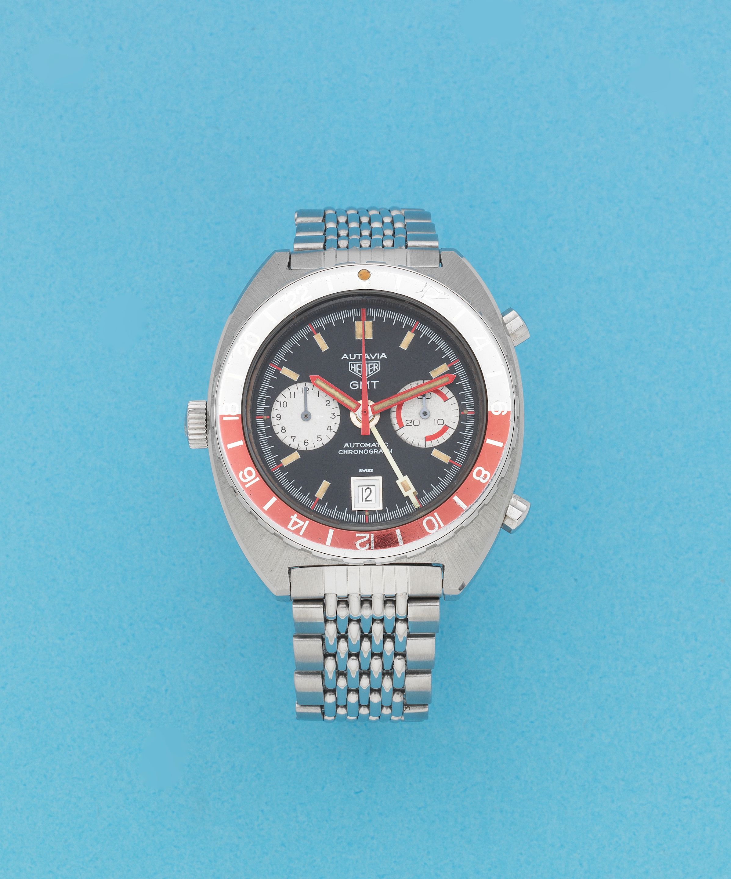 Heuer. A stainless steel automatic calendar chronograph bracelet watch with dual time Autavia GMT, Ref: 11630 GMT, Circa 1974