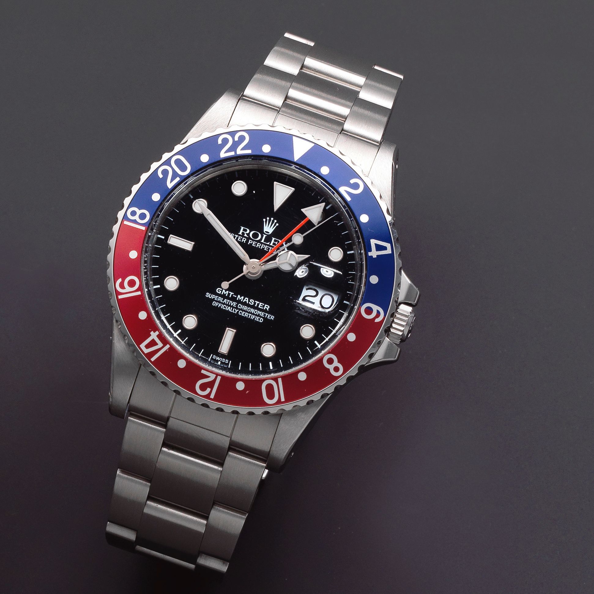 Rolex. A stainless steel automatic calendar bracelet watch with dual time zone GMT-Master, Ref: 16750, Sold 14th November 1988