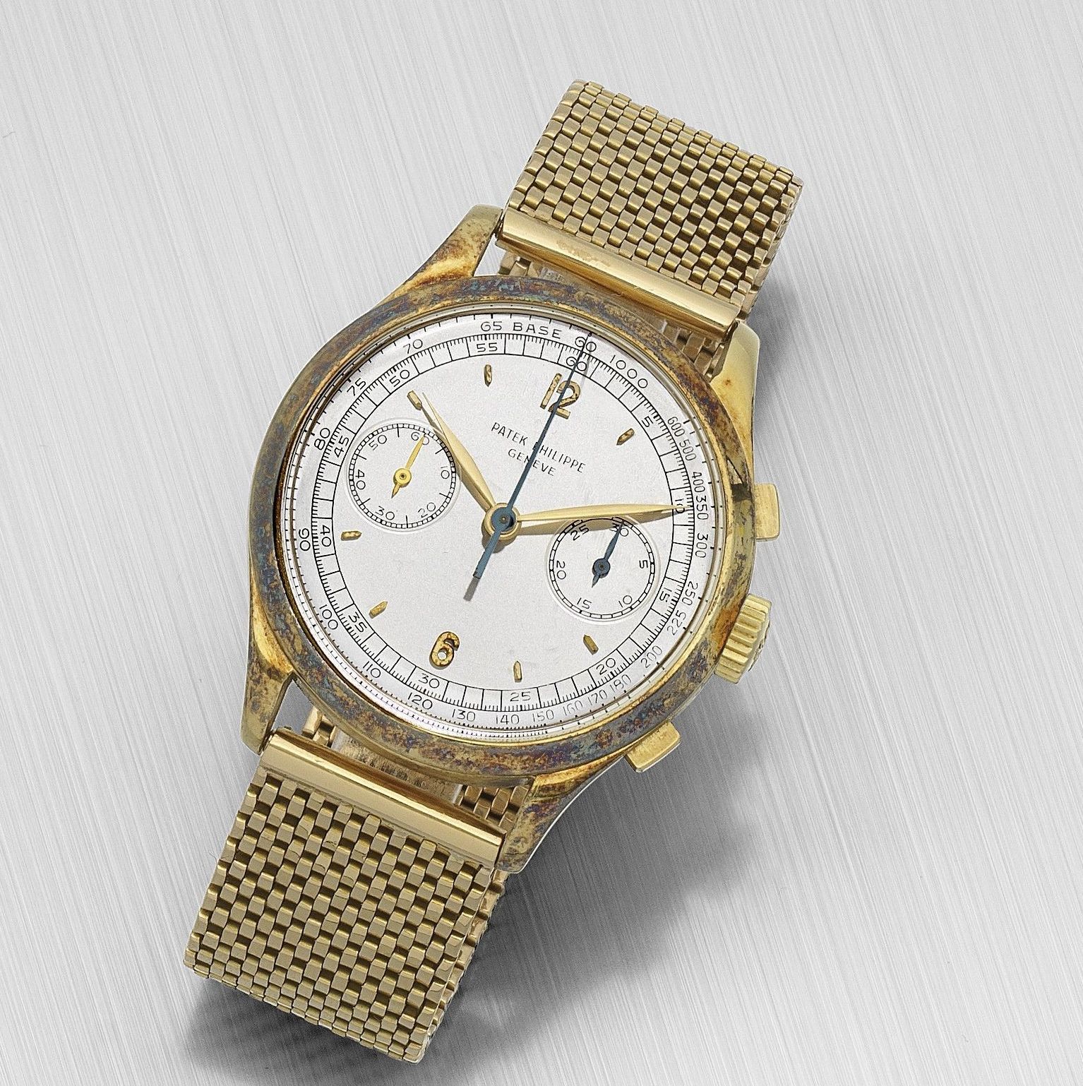 Patek Philippe. A fine and extremely rare large size 18K gold manual wind chronograph bracelet watch sold by direct descent of the original owner Ref: ...