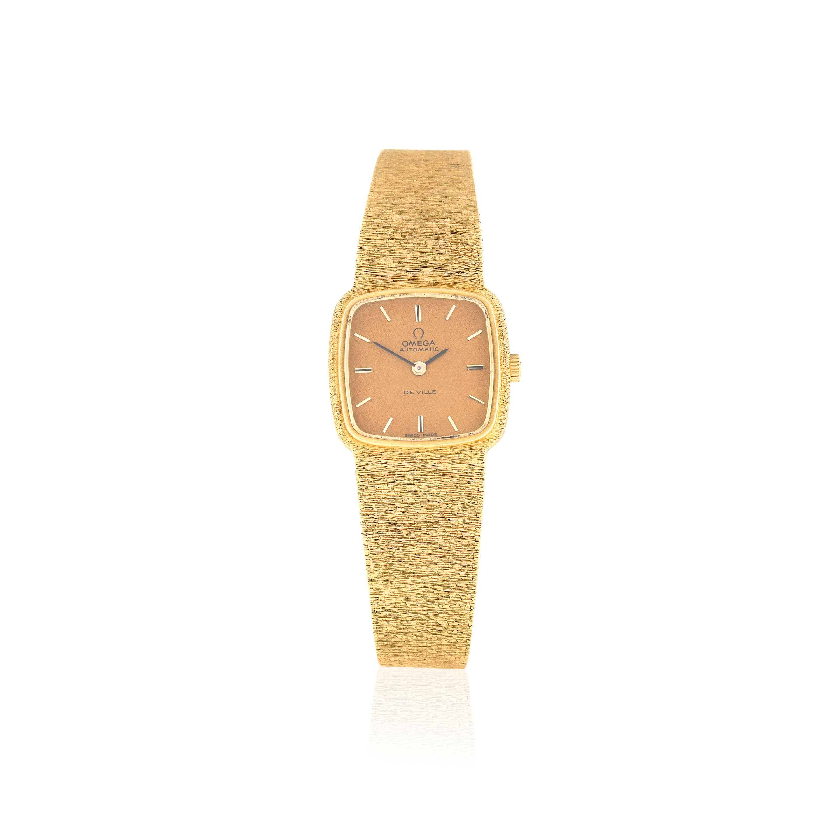 Omega. A lady's 18K gold automatic bracelet watch De Ville, Circa 1980