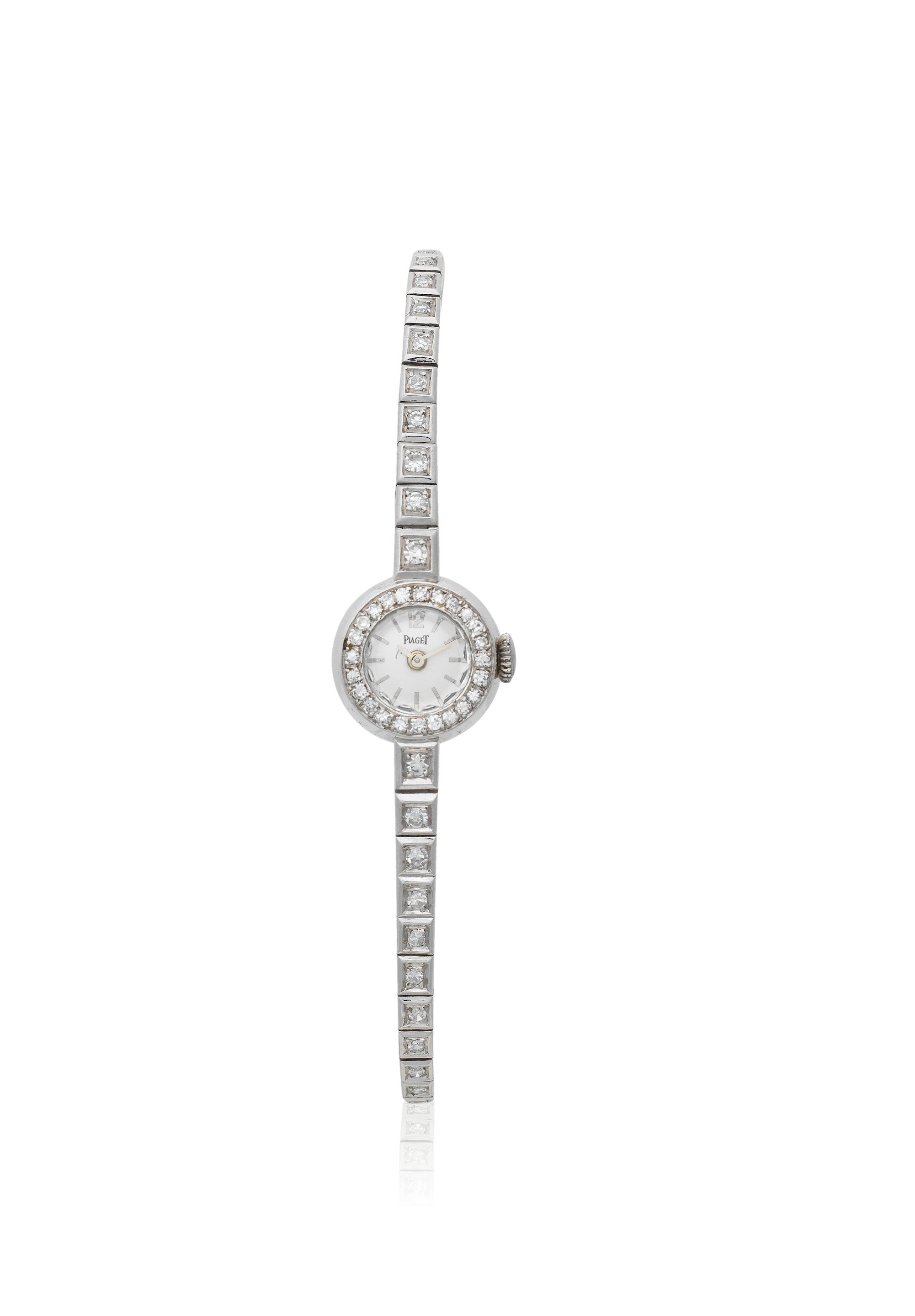 Piaget. A lady's 18K white gold and diamond set manual wind bracelet watch Circa 1980