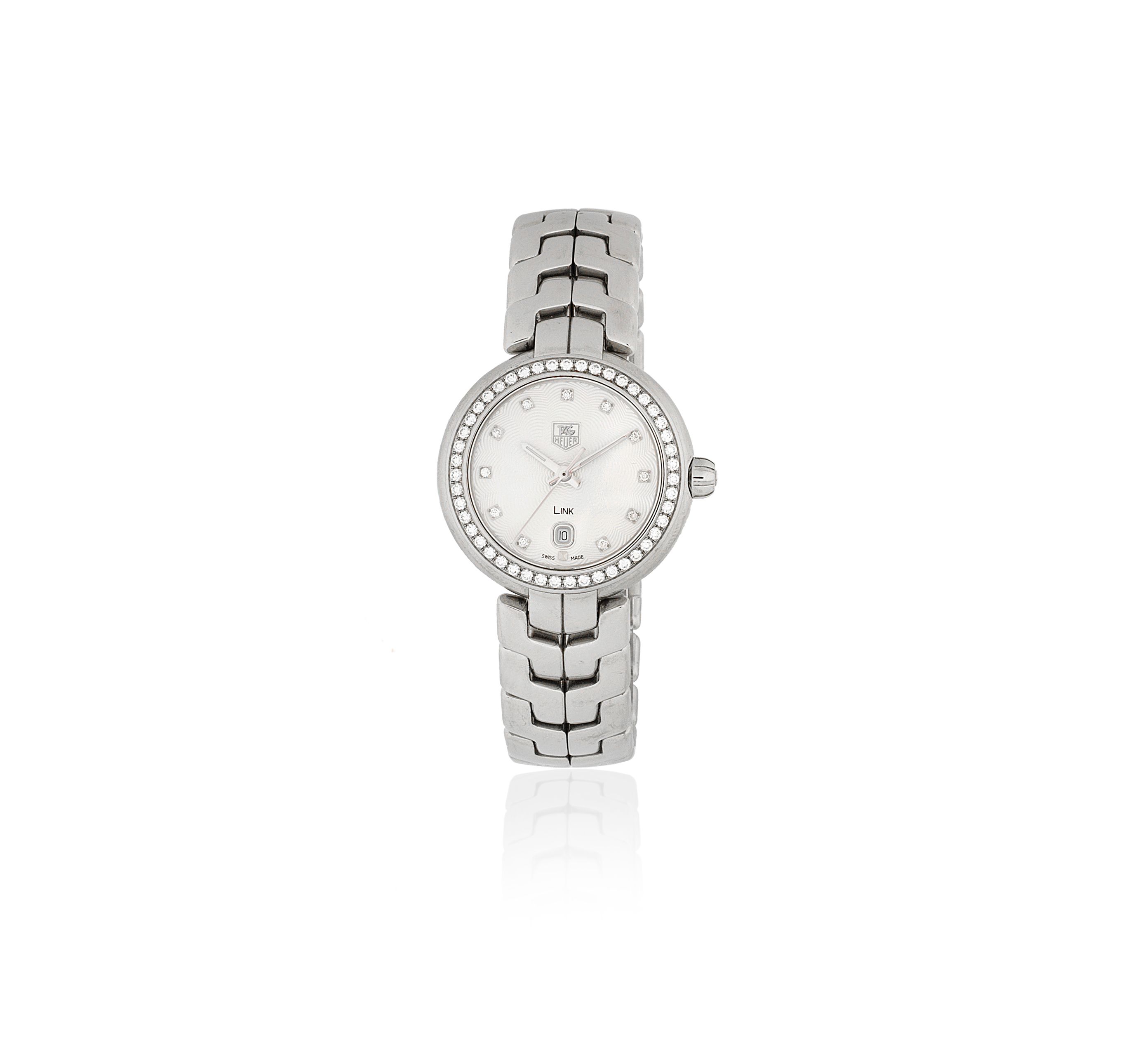 TAG Heuer. A lady's stainless steel and diamond set quartz calendar bracelet watch Link, Ref: WAT1414, Sold 17th February 2012