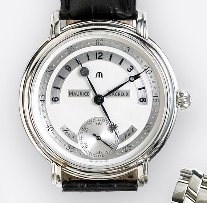 Maurice Lacroix. A stainless steel day-night dual time display retrograde watch