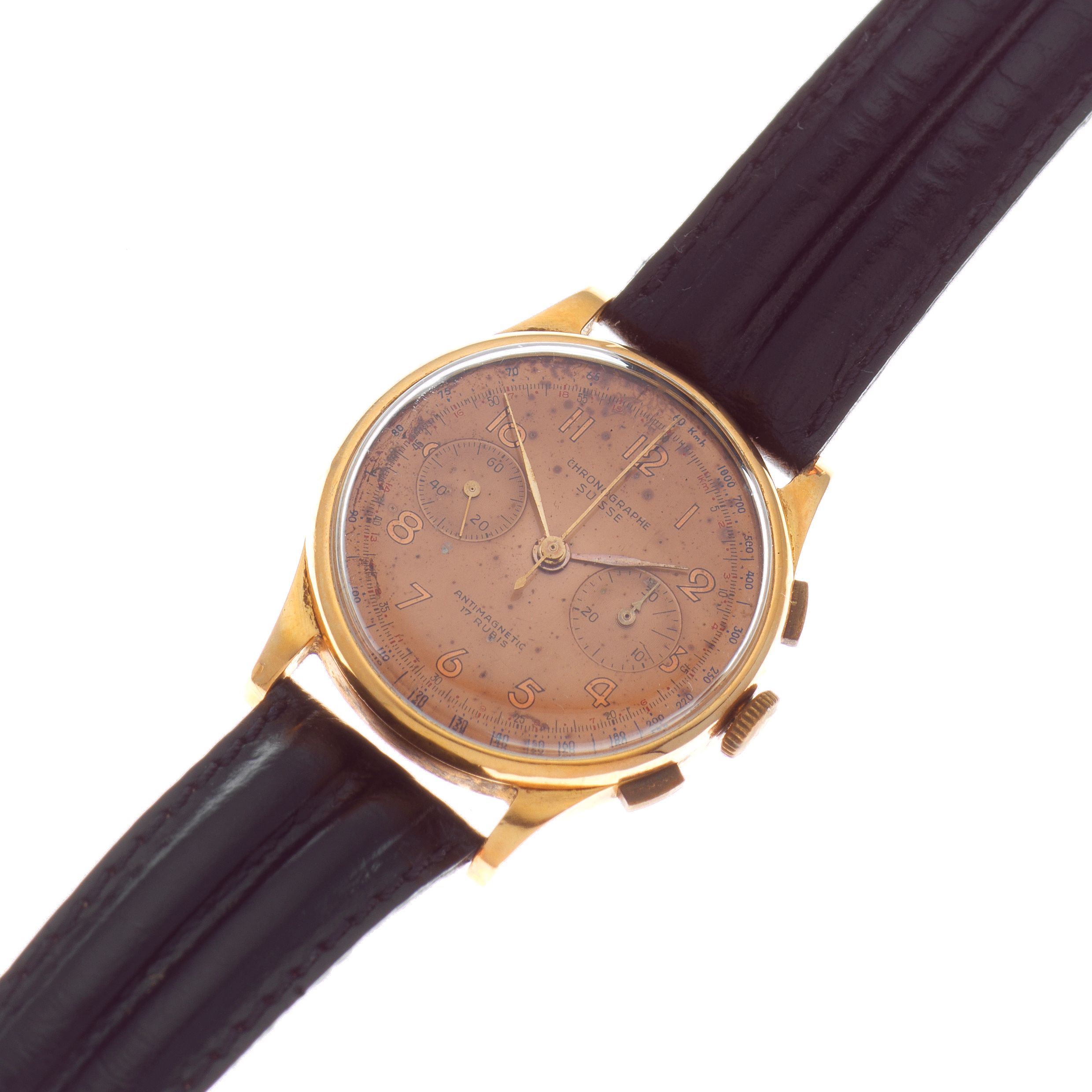 Chronographe Suisse. An 18K gold manual wind chronograph wristwatch Circa 1950