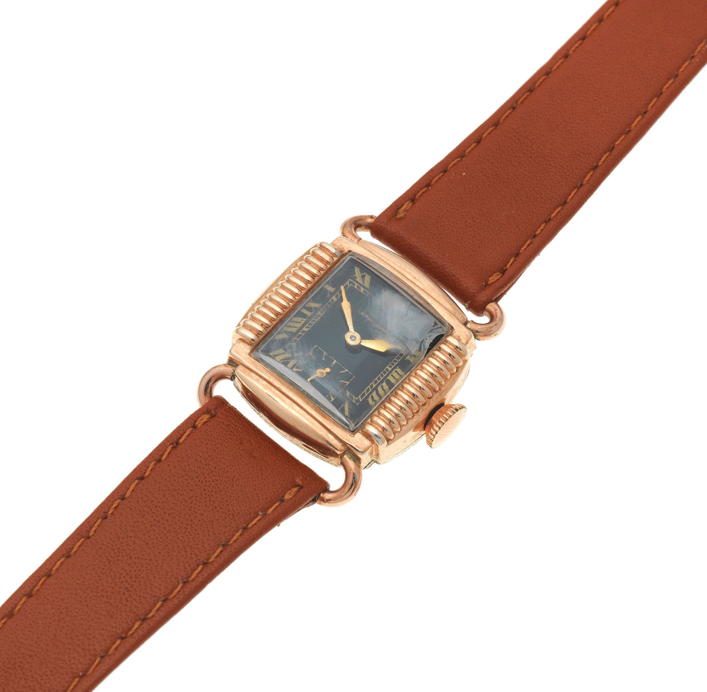 Longines. A gold plated and stainless steel manual wind wristwatch