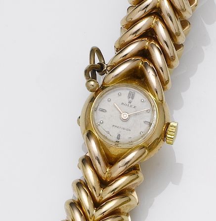 Rolex. A lady's 18ct rose gold bracelet watch1940's
