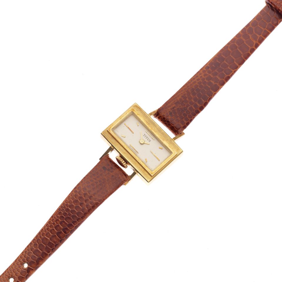 Titus. A lady's 18K gold manual wind rectangular wristwatch Circa 1960