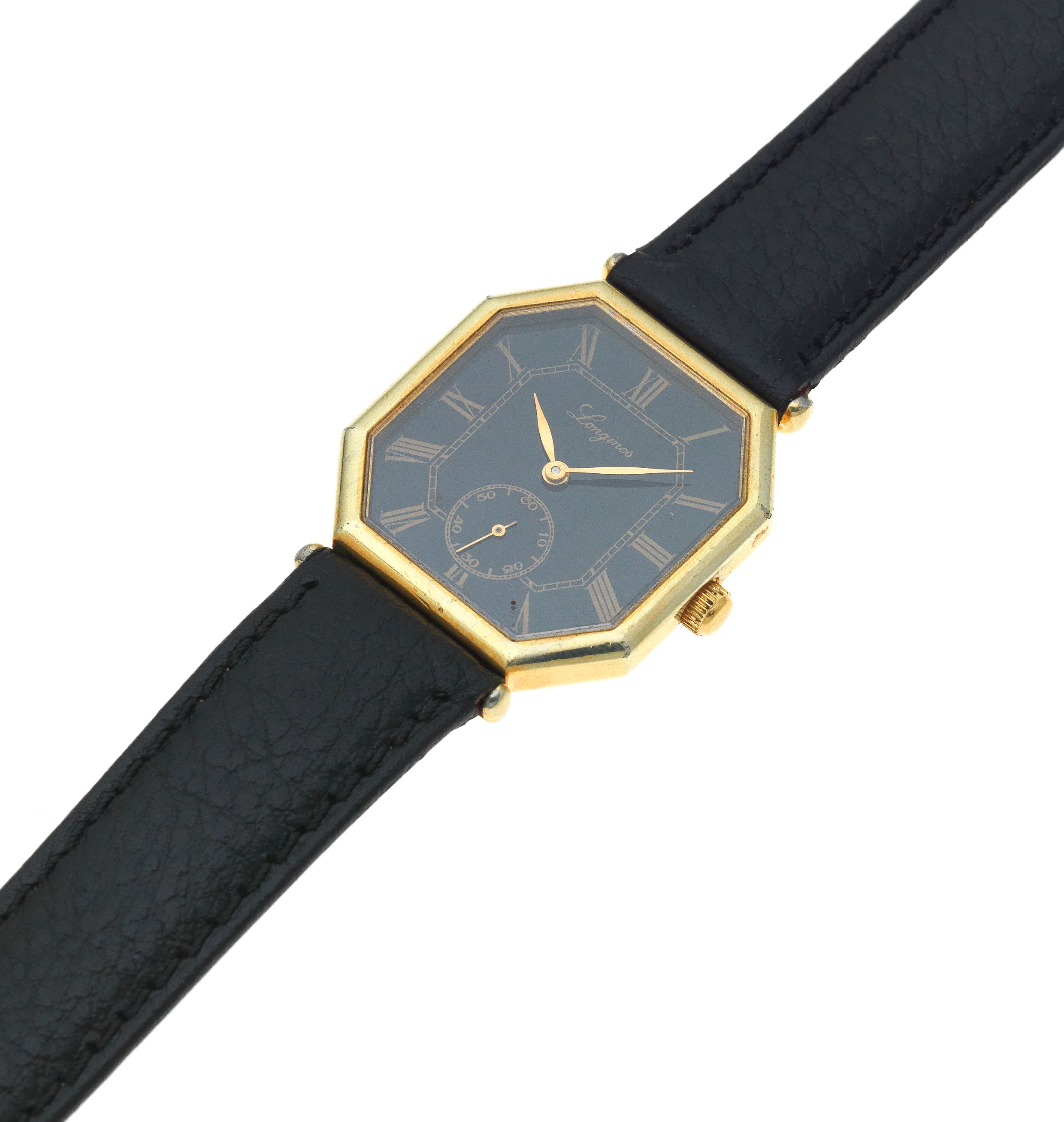 Longines. A gold plated manual wind octagonal wristwatch