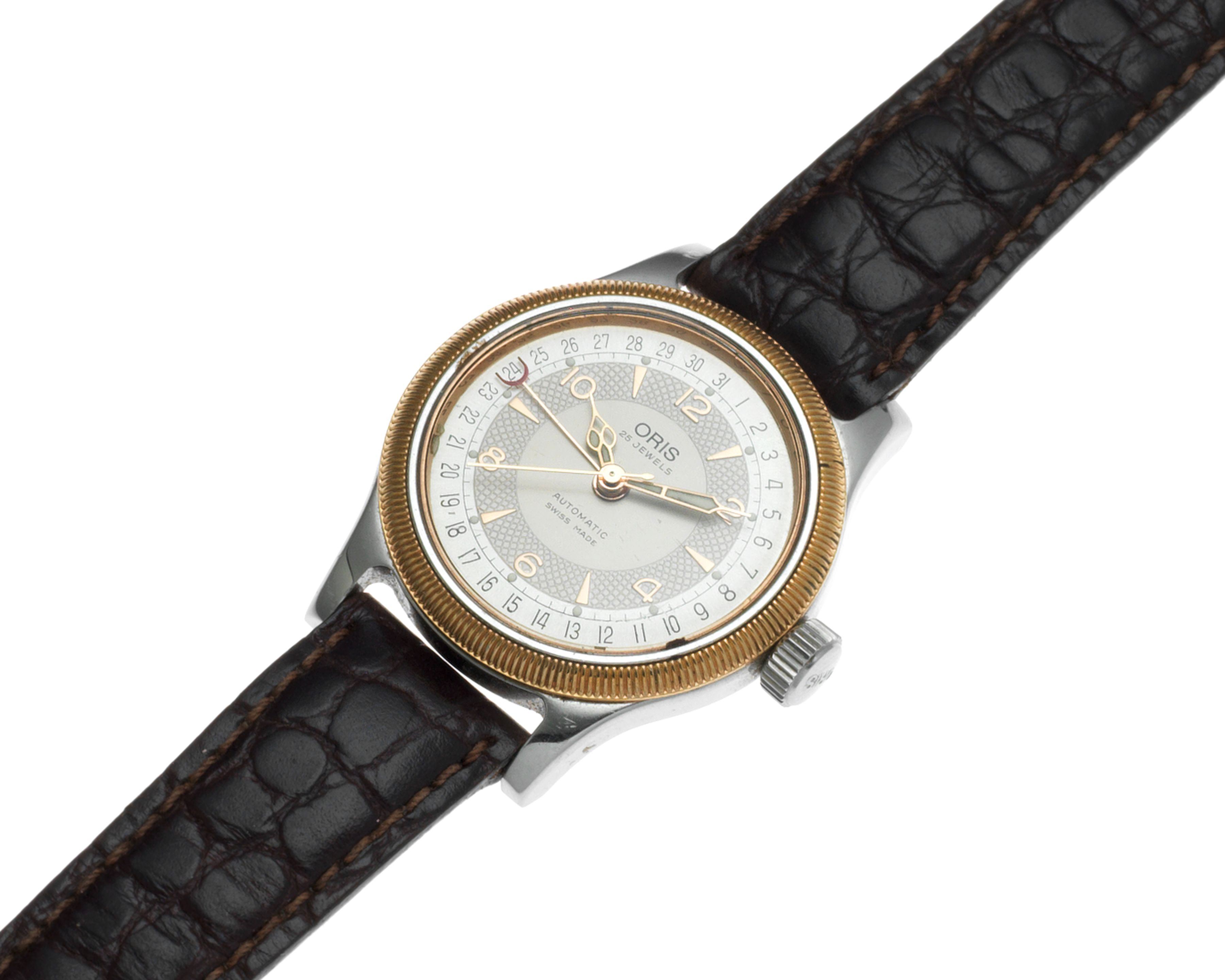 Oris. A stainless steel and gilt automatic calendar wristwatch