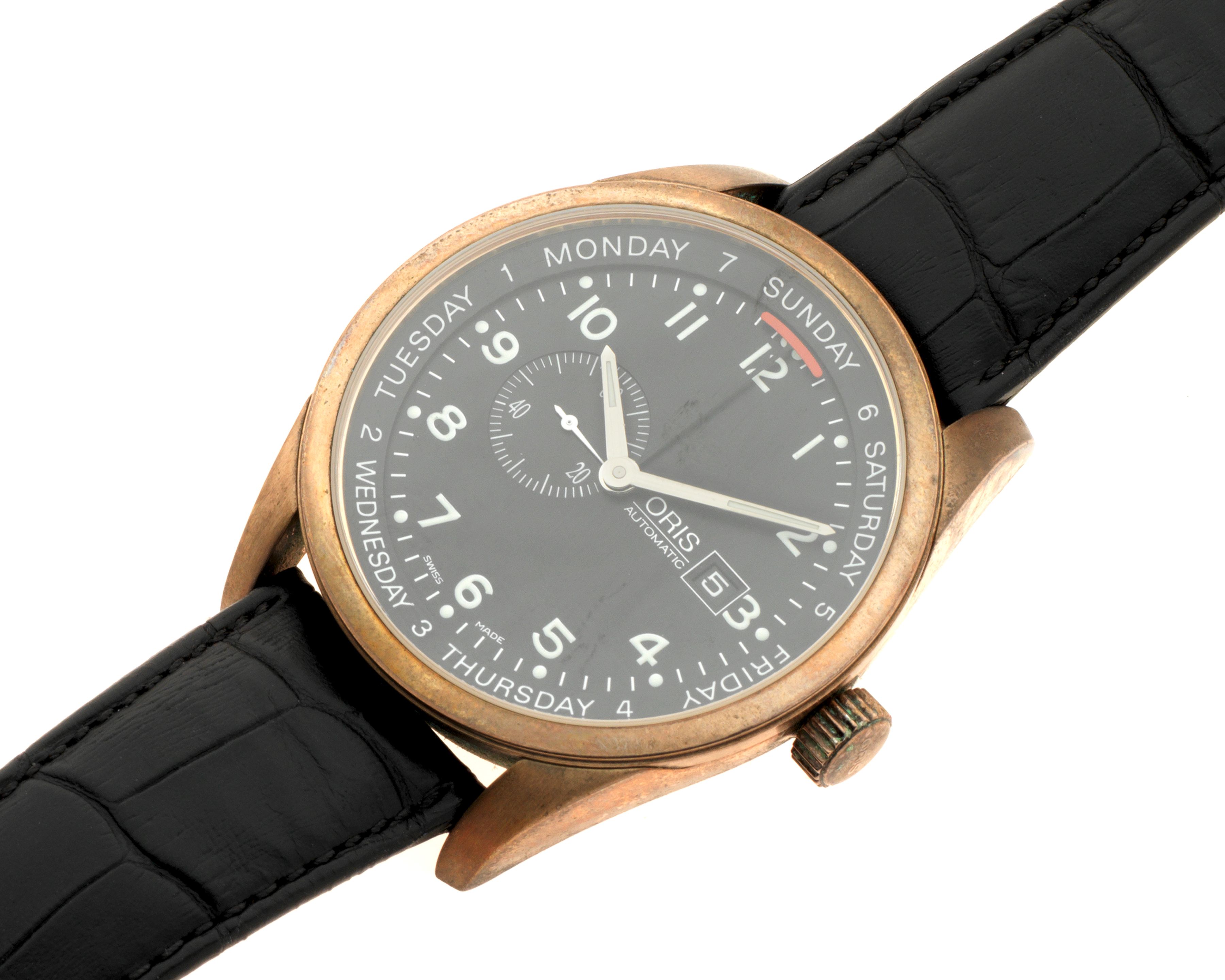 Oris. A gold plated automatic calendar wristwatch