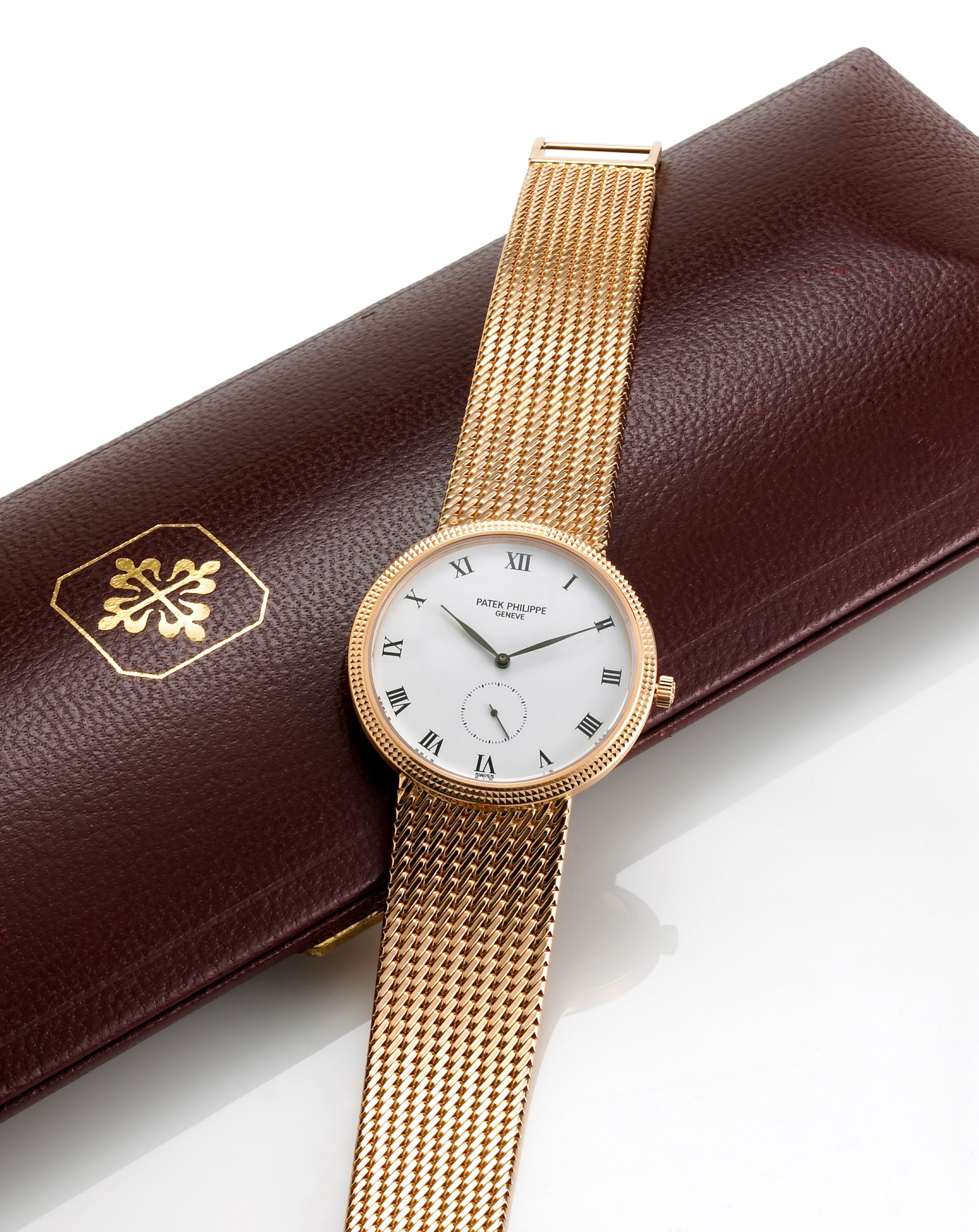 Patek Philippe. A fine eighteen karat rose gold wristwatch with hobnail bezel