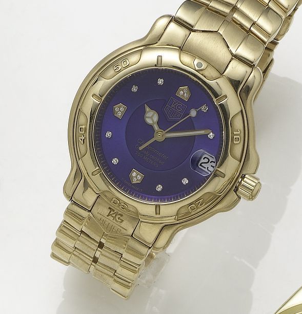 Tag Heuer. An 18ct gold automatic calendar bracelet watchAuto,6000, Recent