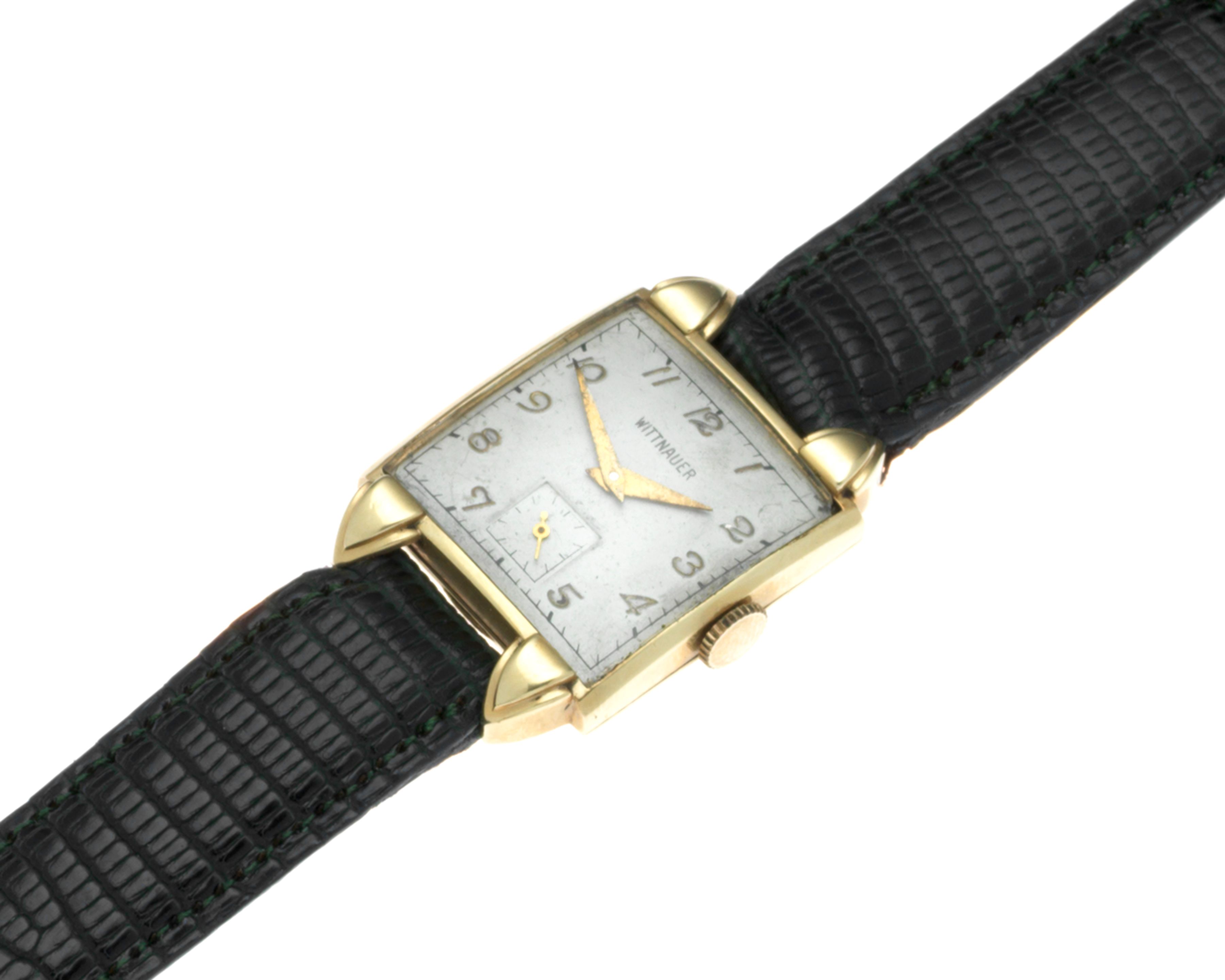 Wittnauer. A 14K gold manual wind wristwatch