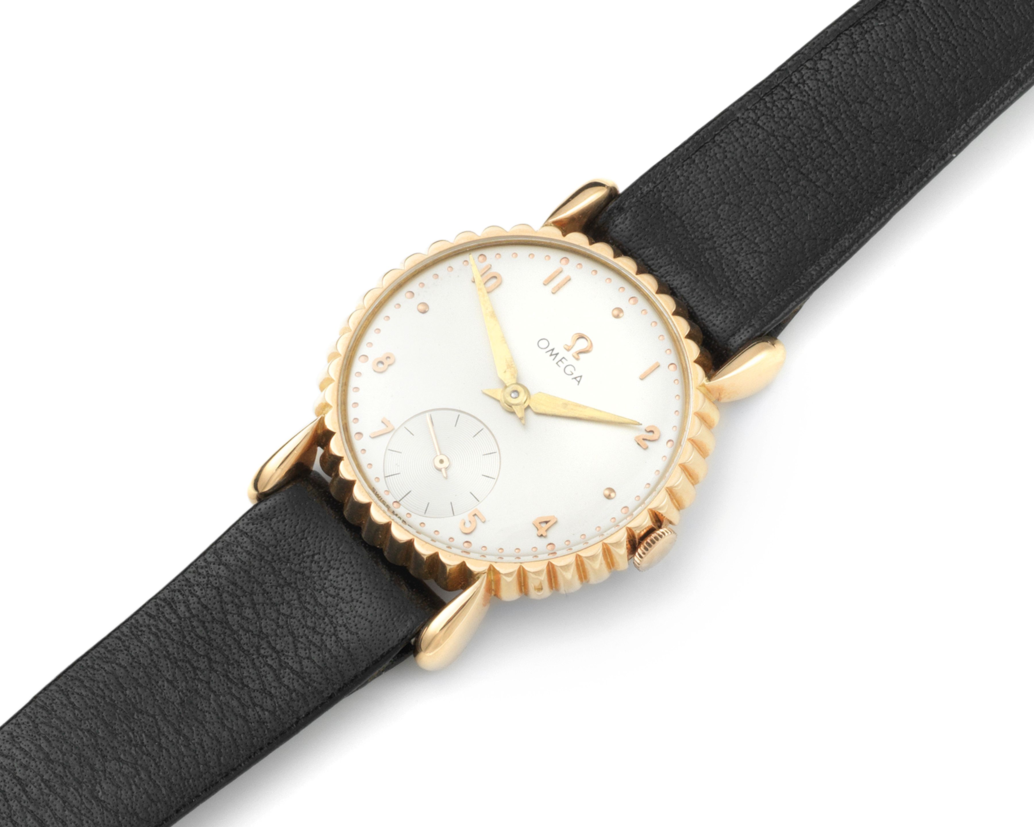 Omega. A midsize gold manual wind wristwatch