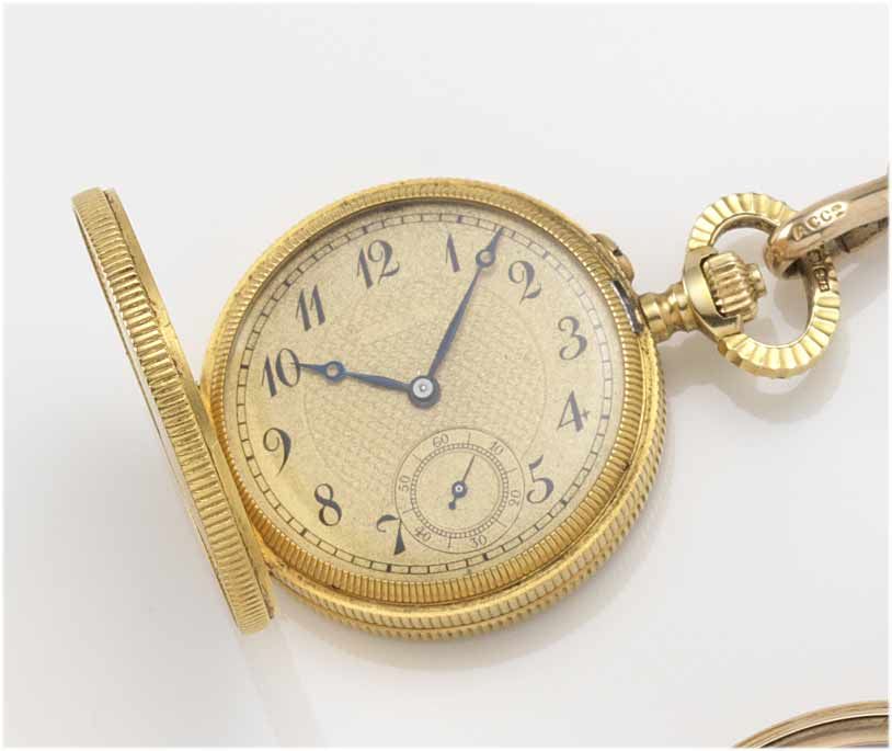 Swiss. An 18ct gold full hunter fob watch in the form of an English 1902 Sovereign, together with a 9ct gold curb link chain London ...