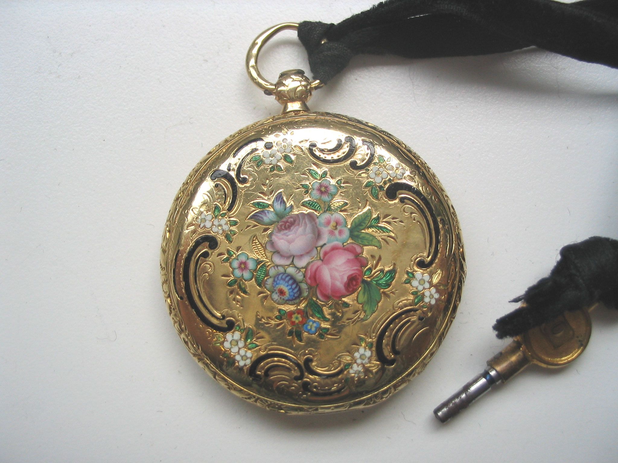 Henry Capt. A mid 19th century 18ct gold fob watch with enamel decorated back 1860's