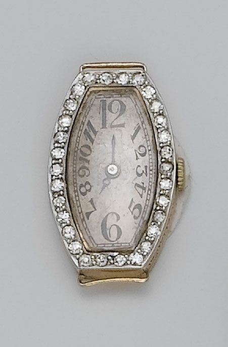 An 18ct gold and diamond set wristwatch together with a similar watch case 1920's