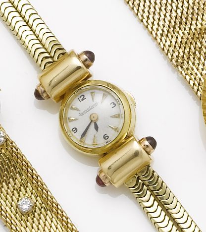 Jaeger LeCoultre. A lady's two colour gold ruby set cocktail watchCase No.89013, 1950's