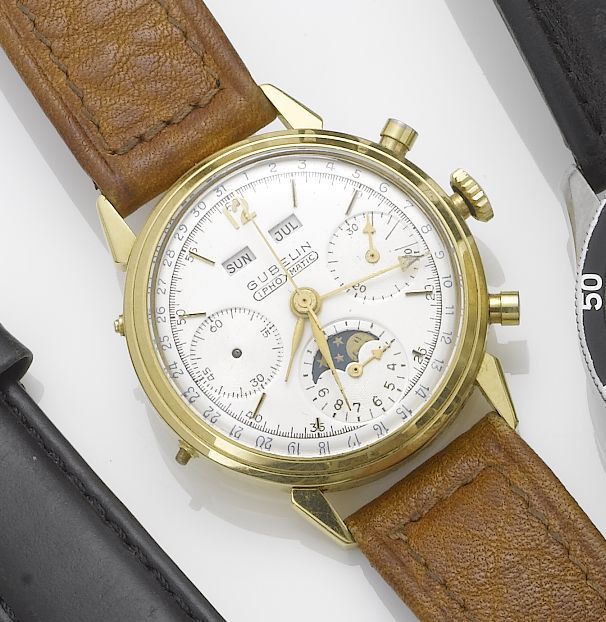 Swiss. An 18ct gold calendar chronograph wristwatch with moon phases1950's