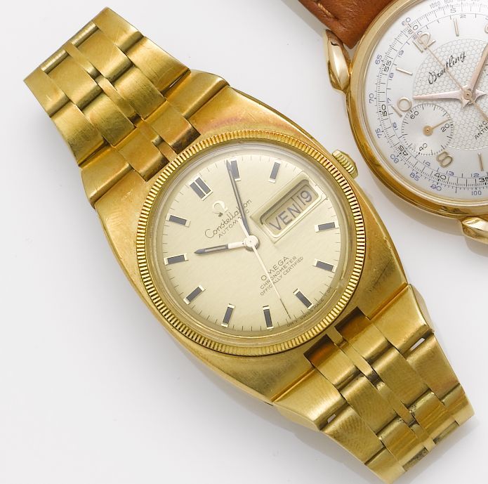 Omega. An 18ct gold automatic chronometer centre seconds calendar bracelet watchConstellation, 1960's