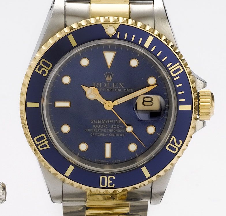 Rolex. A steel and gold automatic calendar bracelet watchSubmariner, Ref:16610, 1991