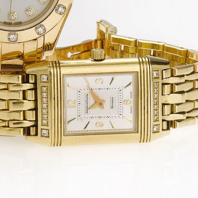 Jaeger Le Coultre. An 18ct gold and diamond set bracelet watch with box and papers Reverso, Sold 14th October 1999