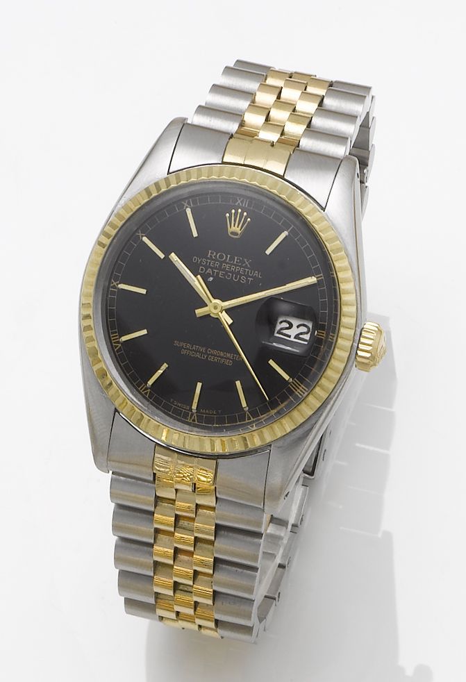 Rolex. A stainless steel and gold automatic centre seconds calendar bracelet watchDatejust, 1970's
