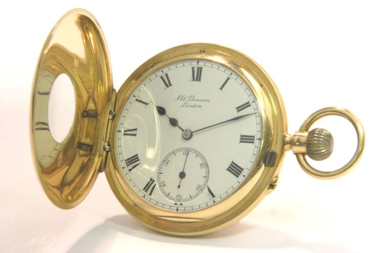 J.W.Benson. An 18ct gold half hunter pocket watch hallmarked London 1911