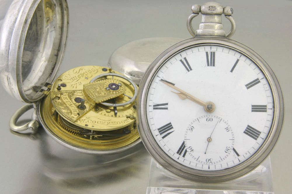A lot of 2 silver pair cased pocket watches