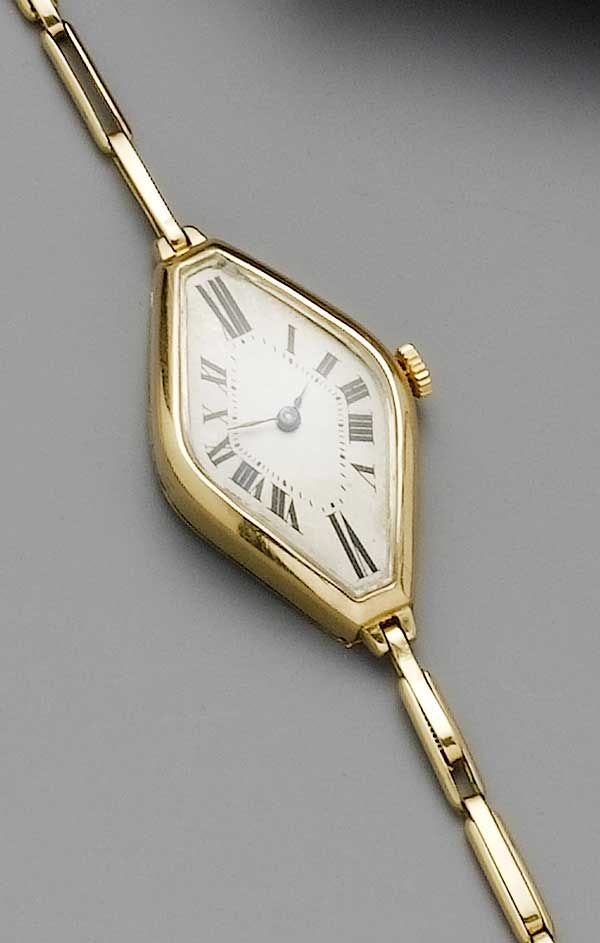 Swiss. An 18ct gold ladies dress watch on gold strap1920s