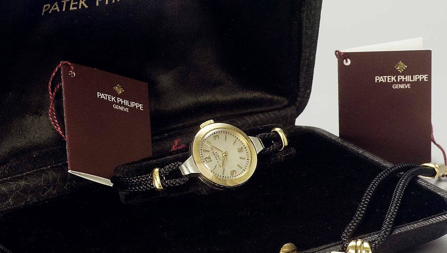 Patek Philippe. A lady's steel and gold wristwatch together with fitted factory boxRef:23,1930s