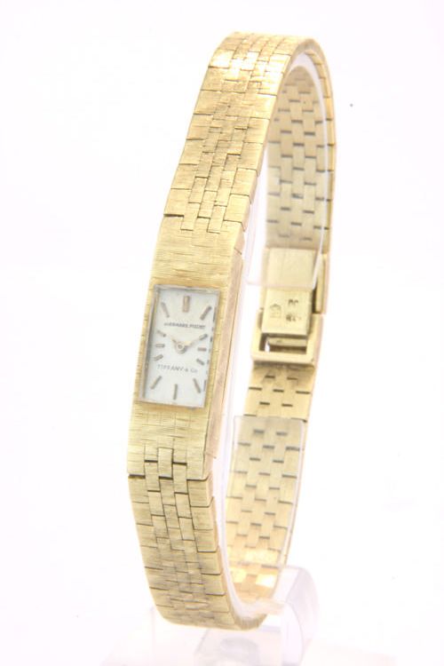 Audemars Piguet. A lady's 18ct gold back wind wristwatchRetailed by Tiffany & Co. 1950s