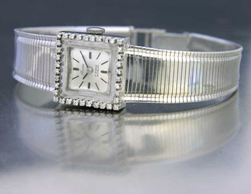 Rose. A lady's 14ct white gold and diamond set bracelet watchhallmarked 1963