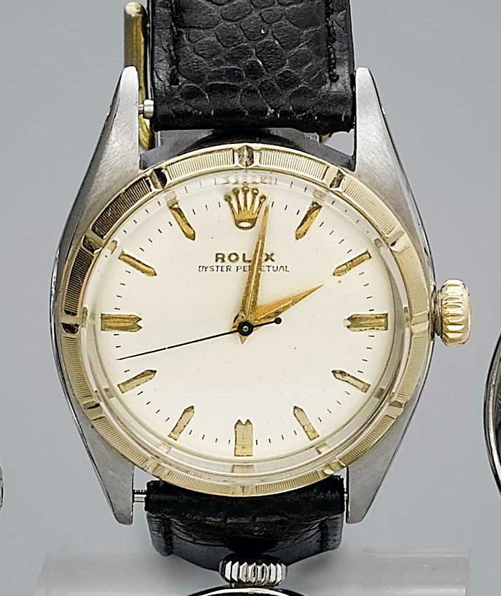 Rolex. A gents steel and gold automatic wristwatchOyster Perpetual, Ref:6587, 1954
