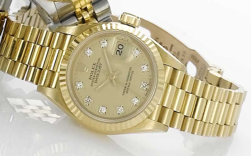 Rolex. An 18ct gold automatic calendar bracelet watch with fitted box and papers Ref:69000A, Sold in 1986