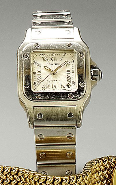 Cartier. A stainless steel automatic calendar bracelet watch with box and papersSantos, Sold in 2000