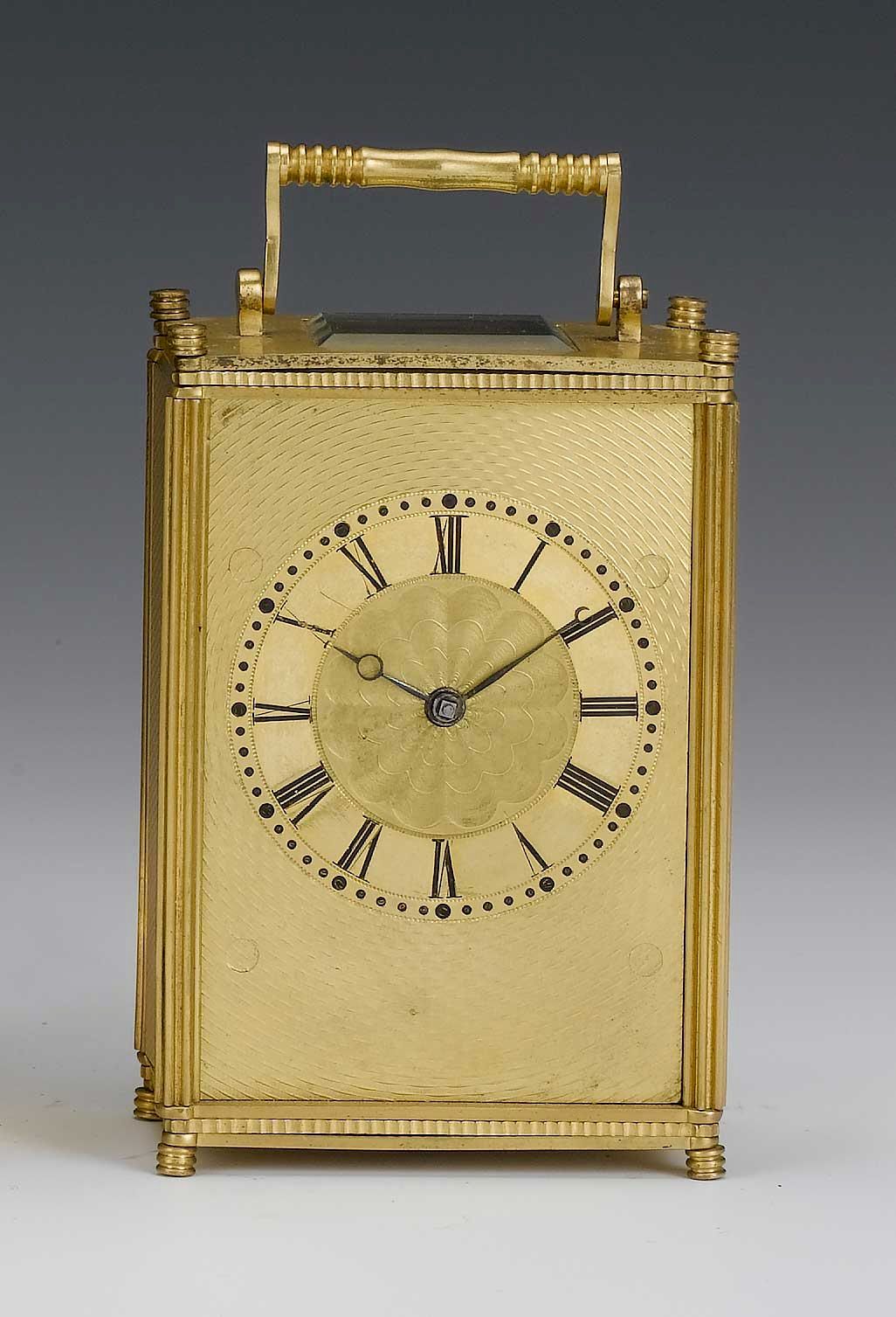 A mid 19th century English gilt brass travelling timepiece with fusee movement and lever platform escapement Unsigned
