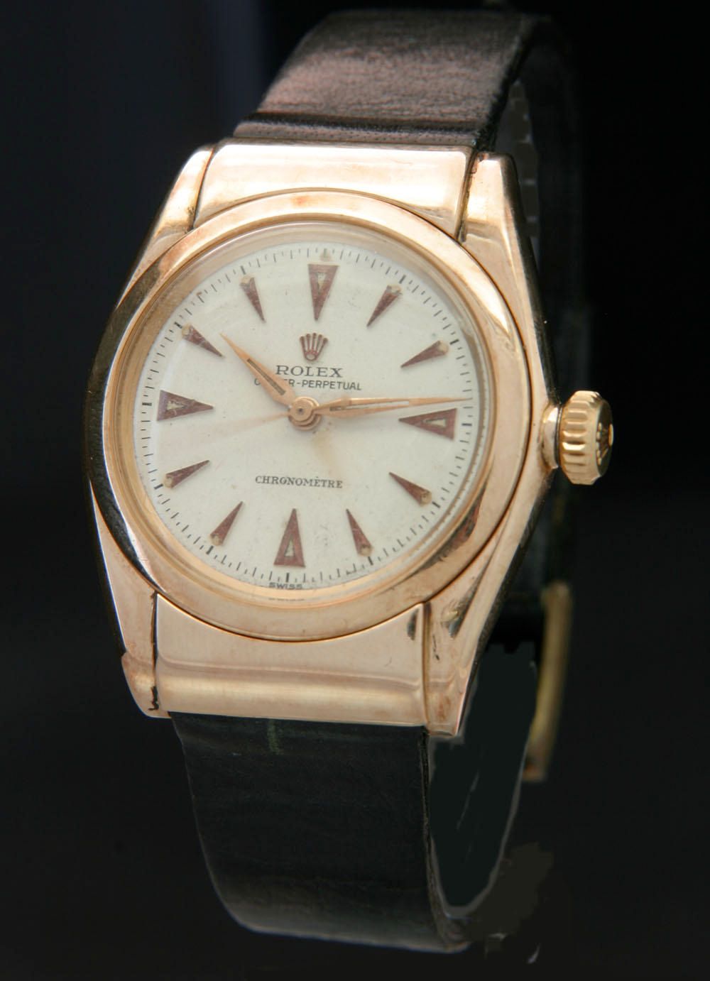 Rolex. A rare 14ct gold automatic wristwatchOyster Perpetual 'hooded bubbleback' Ref:3065, 1940s