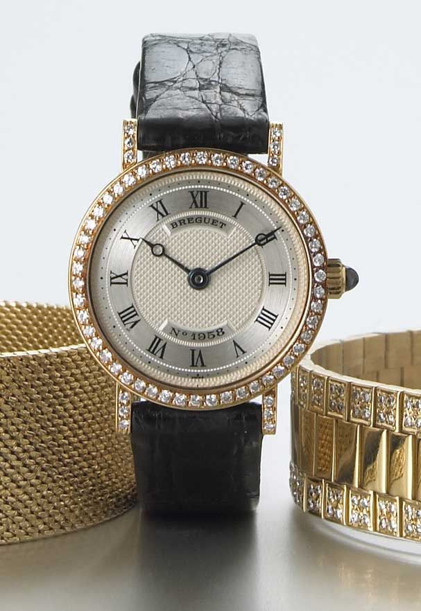Breguet. A Lady's 18k gold and diamond set wristwatchNo.1958, circa 2000