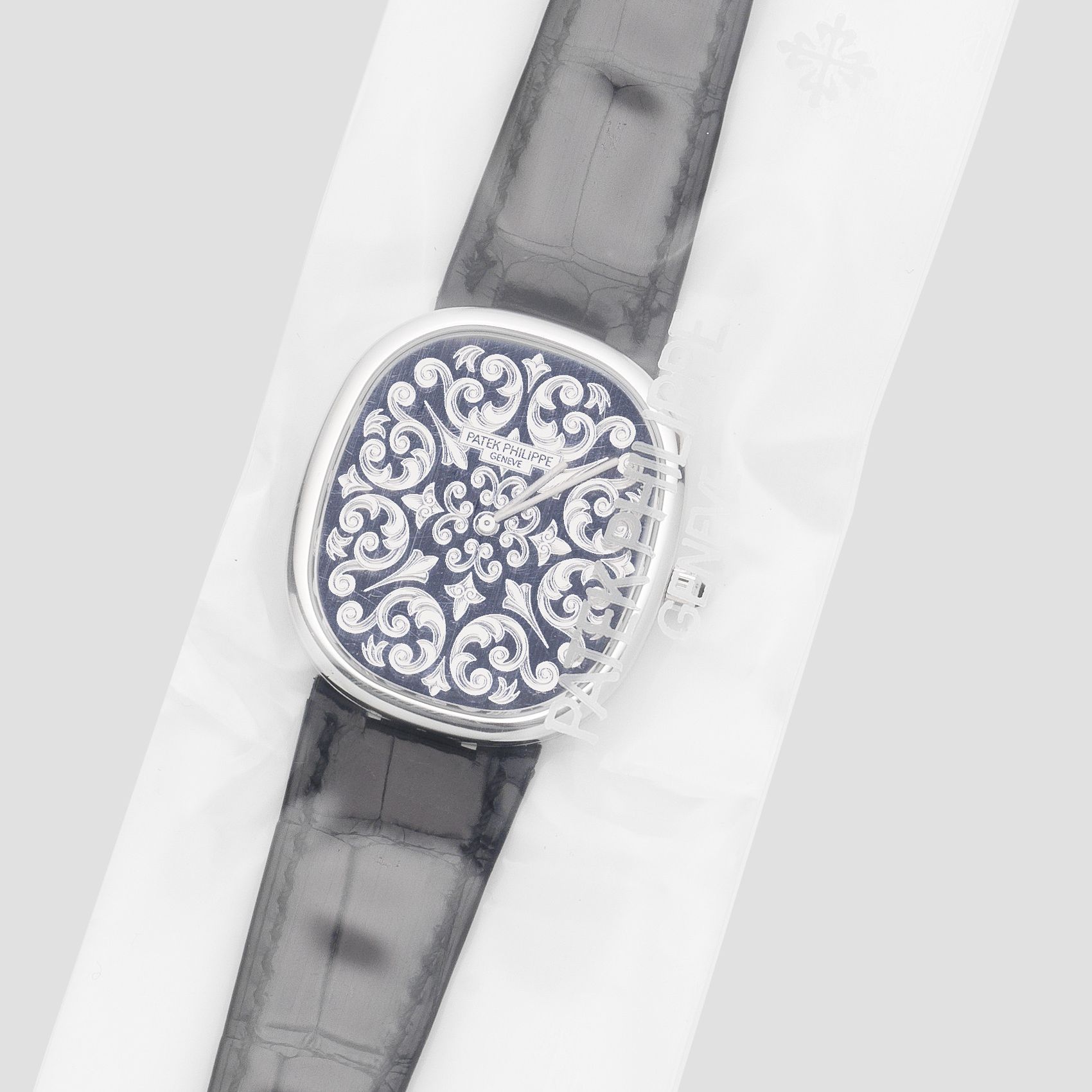 Patek Philippe. A very fine and very rare factory sealed platinum Anniversary automatic wristwatch with hand engraved and enamelled dial Golden Ellipse 50th Anniversary, Ref: ...