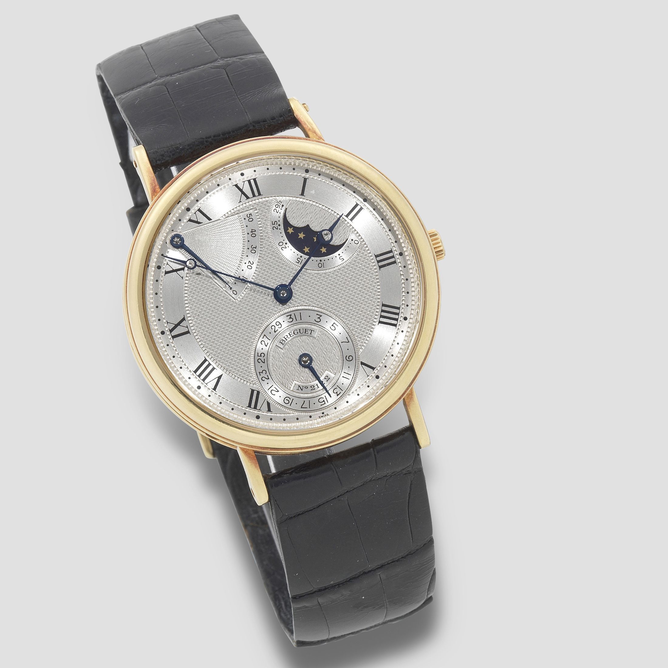 Breguet. An 18K gold automatic calendar wristwatch with moon phase and power reserve Ref: 3130, Circa 2000