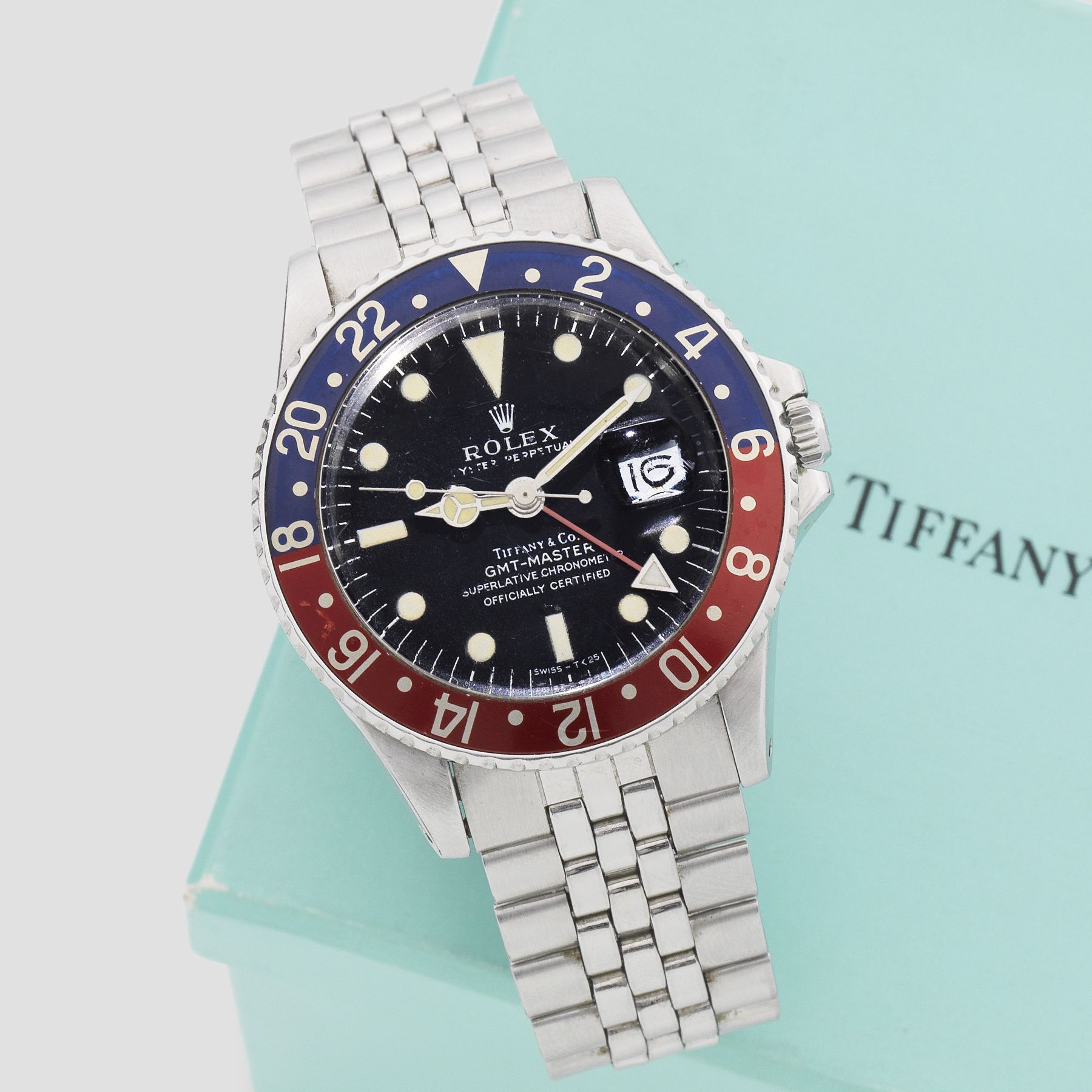 Rolex. A rare stainless steel automatic calendar bracelet watch with dual time zone retailed by Tiffany & Co GMT Master, Ref: 1675, Circa 1970
