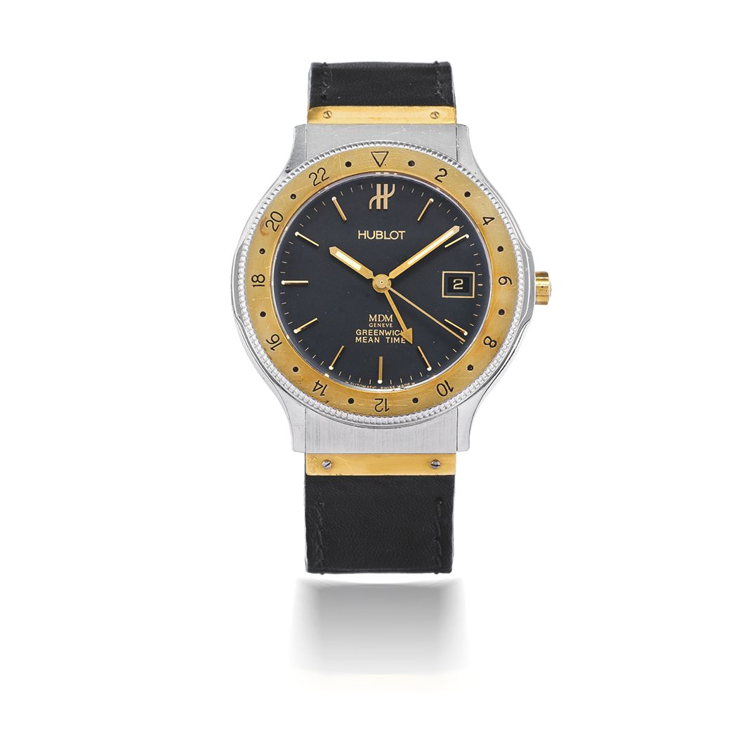 HUBLOT. MONTRE BRACELET EN OR ET ACIER AVEC DATE ET 2ND FUSEAU HORAIRE MOUVEMENT AUTOMATIQUE HUBLOT. A STAINLESS STEEL AND GOLD AUTOMATIC CALENDAR WRISTWATCH WITH ...