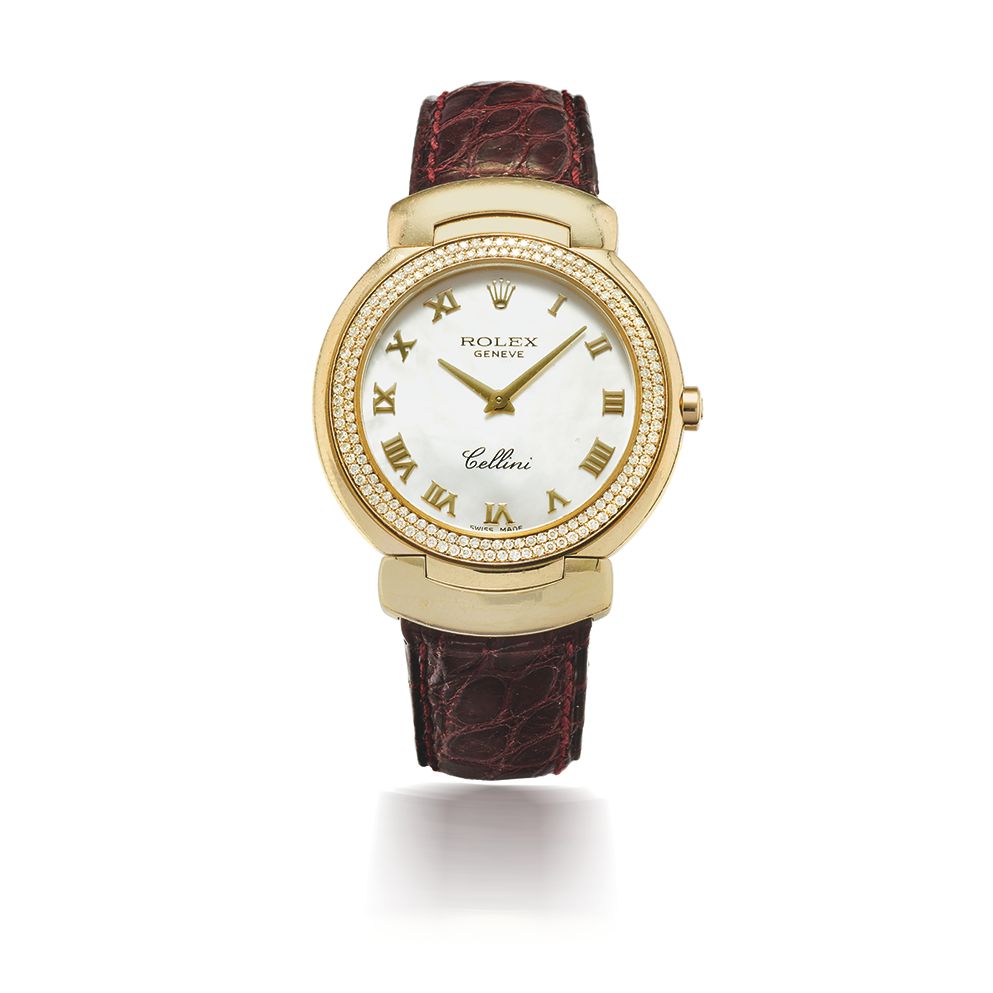 ROLEX. MONTRE BRACELET DE DAME EN OR BLANC 18K (750) SERTIE DE DIAMANTS CADRAN NACRE MOUVEMENT QUARTZ ROLEX. A LADY'S 18K WHITE GOLD AND DIAMOND ...