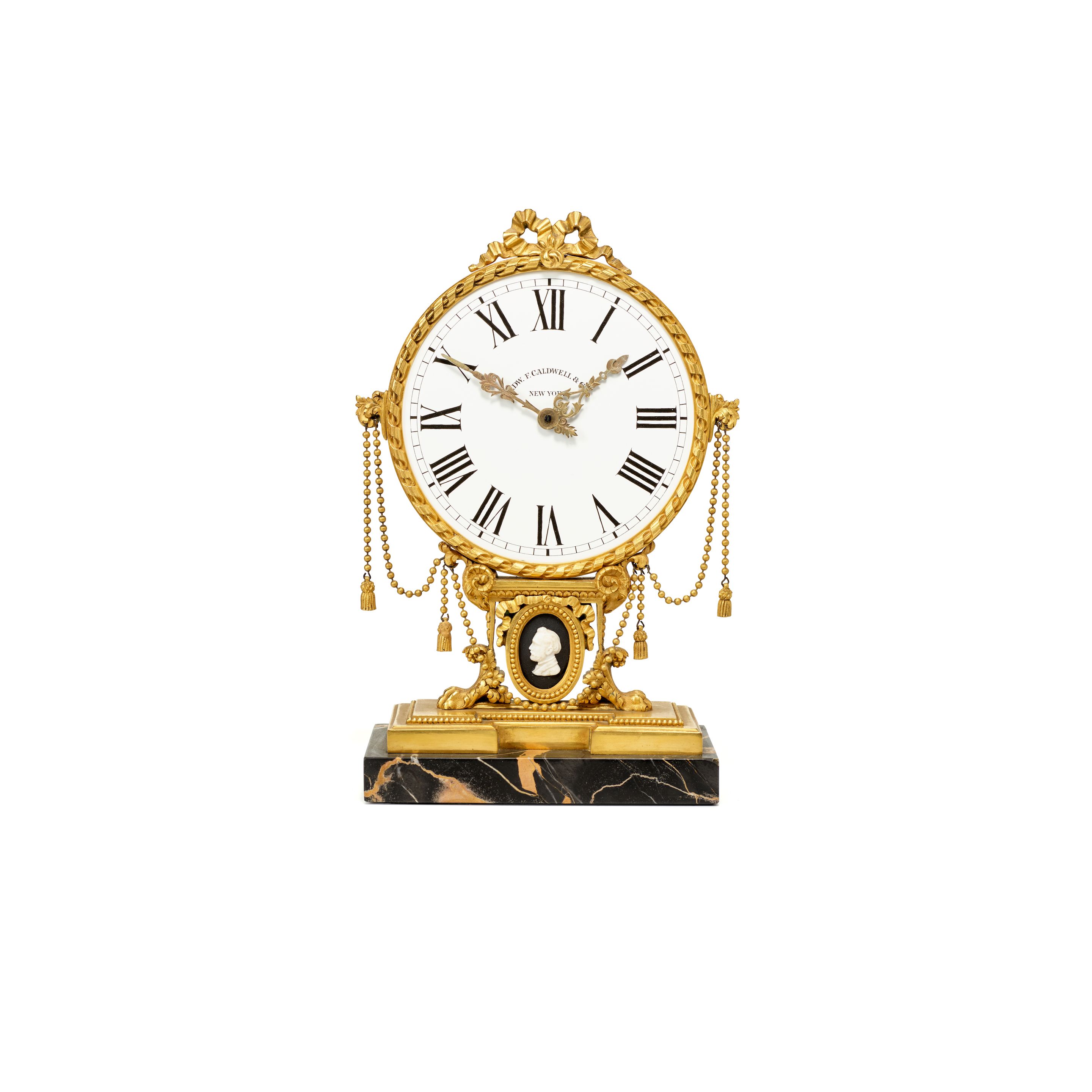 EDWARD F. CALDWELL & CO., NEW YORK. A FINE BELLE EPOQUE GILT BRONZE AND MARBLE SMALL DESK TIMEPIECECirca 1907