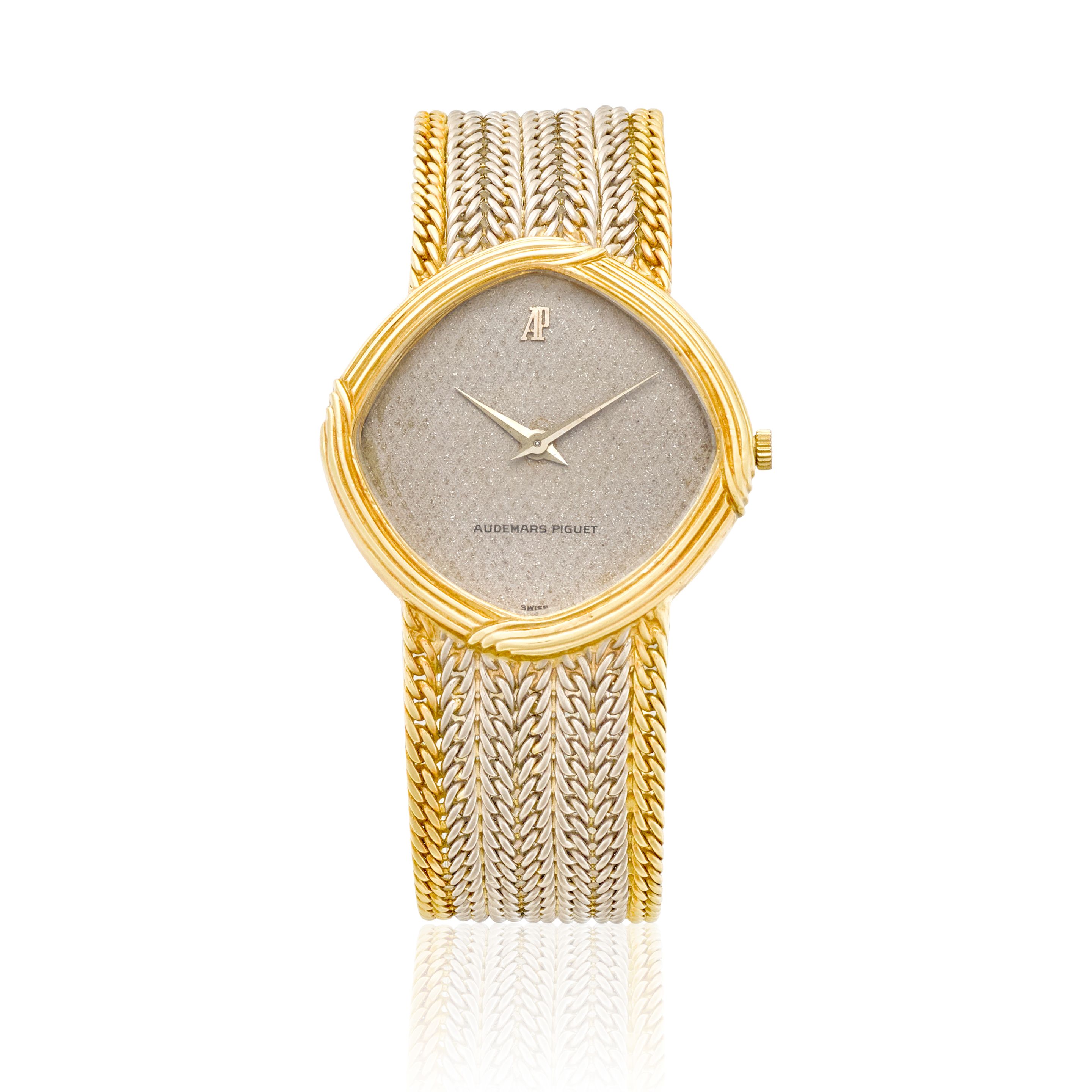 AUDEMARS PIGUET. A FINE AND UNUSUAL 18K WHITE AND YELLOW GOLD MANUAL WIND BRACELET WATCHc.1970s
